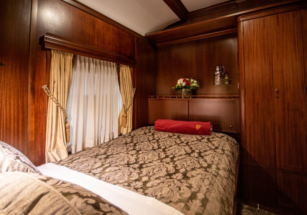Queen Sized bed in a train car
