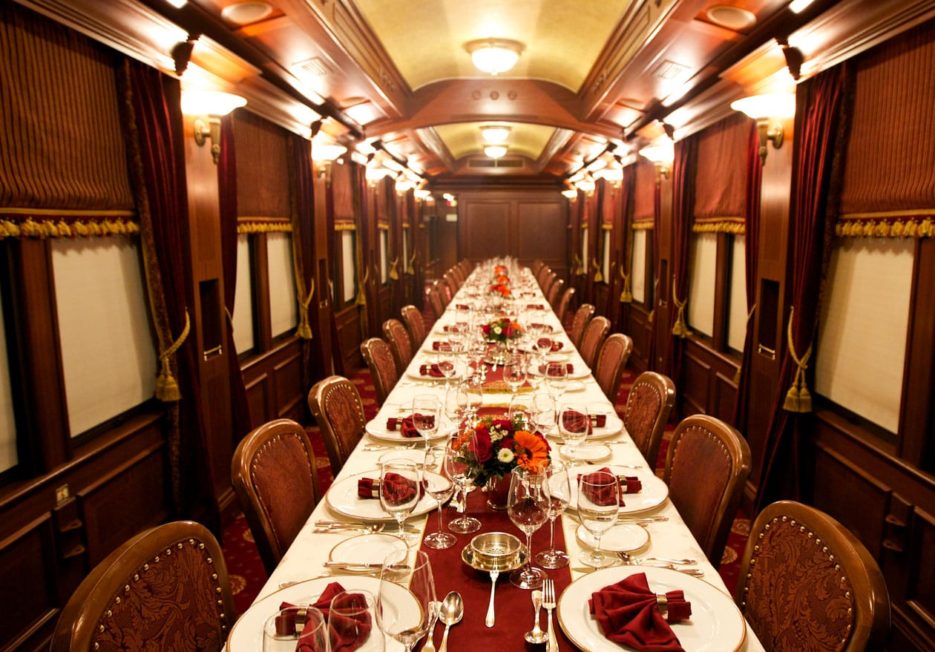 set dinner table in a private railcar
